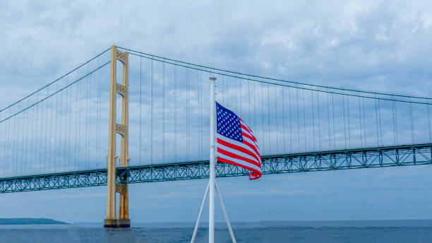 istock summer sunrise on the Mackinac bridge - Michigan 1313751847