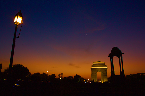 This is India Gate at night with beautiful sunset and lighting.