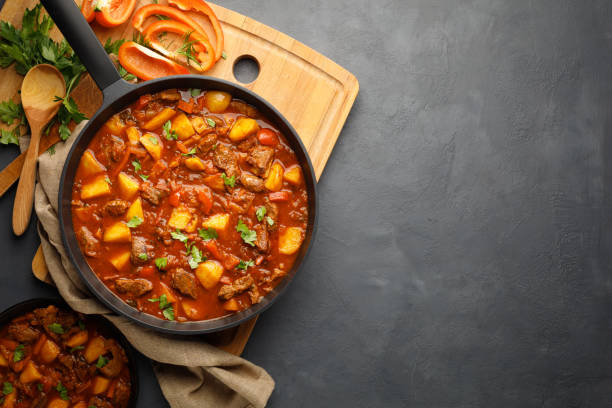 istock Goulash, beef stew with vegetables in tomato sauce 1313768460