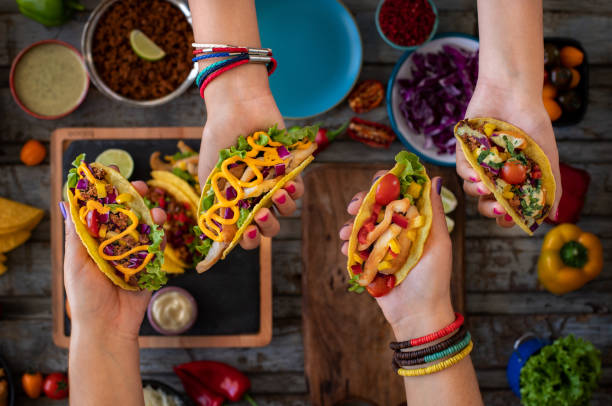 istock Variation of Mexican Tacos with spicy Salsa and nacho tortilla chips . 1313772495
