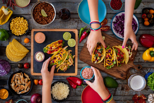 istock Variation of Mexican Tacos with spicy Salsa and nacho tortilla chips . 1313772496
