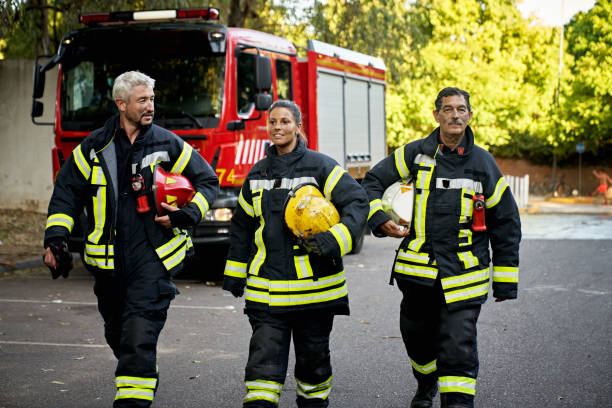 istock Male and Female Firefighters in Protective Workwear 1313773487