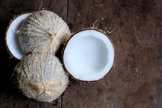 istock A group of a half cut of coconuts on old aluminium table 1313773581