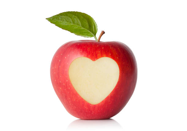 яблоко с символом сердца - red delicious apple red gourmet apple стоковые фото и изображения