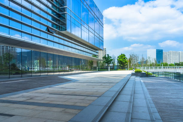 istock Empty brick road nearby office building 1313777648