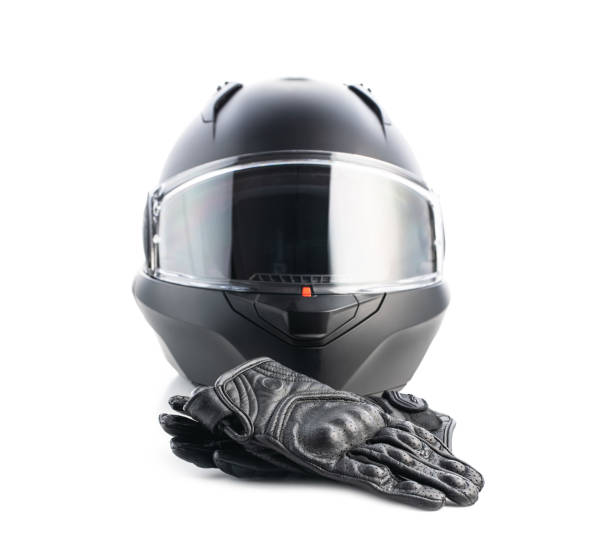 istock Safety motorcycle accessories. Leather gloves and helmet 1313783311