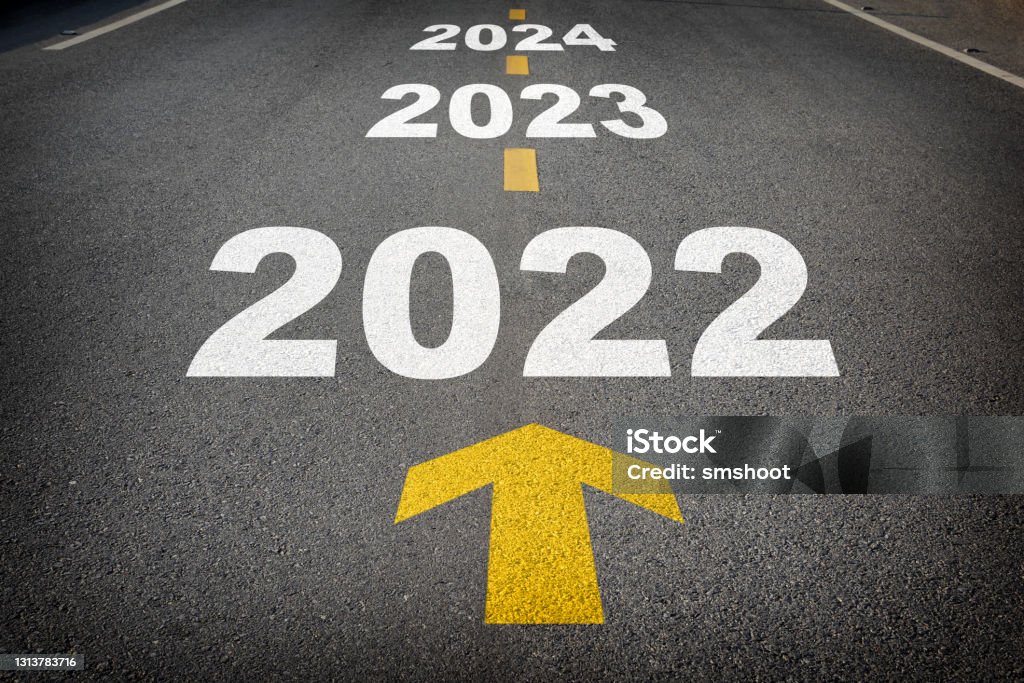 New year 2022 to 2024 and yellow arrow on asphalt road Road to success concept and sustainable development idea The Way Forward Stock Photo