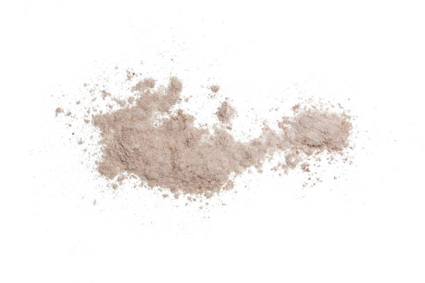 istock Beige cosmetic or make up powder isolated on white. 1313784829