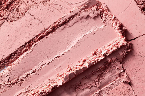Cosmetic clay powder Crushed pink eyeshadow. Close-up photography. make up powder stock pictures, royalty-free photos & images
