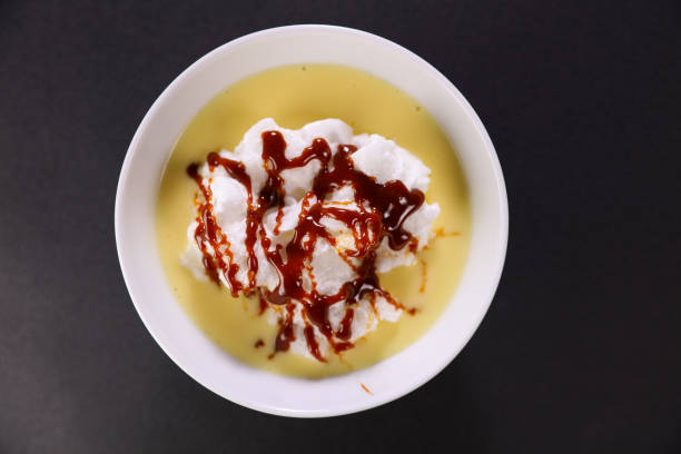 istock floating island with custard cream 1313787026