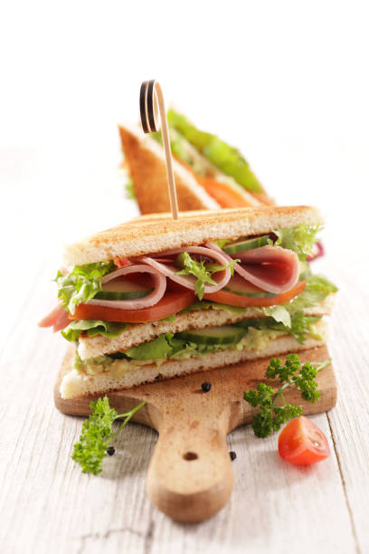 istock sandwich toast with ham, cheese and vegetables 1313787042
