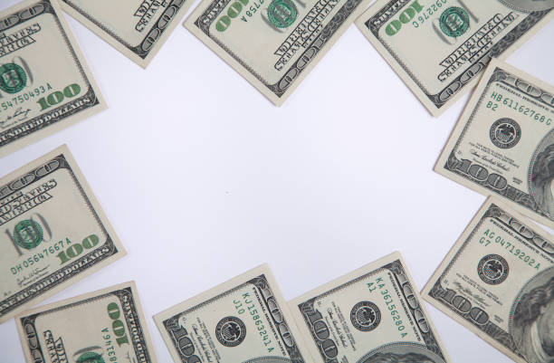 istock A pile of one hundred US banknotes. Dollar background image. 1313787164