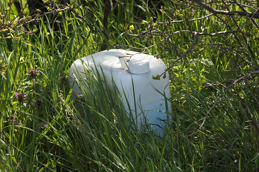 Old canisters in the grass