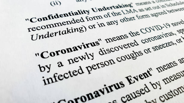 istock Covid-19 coronavirus defined in an agreement in a business context 1313792870