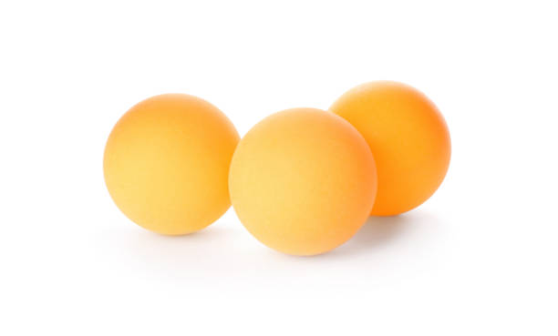 istock Orange ping pong balls isolated on white 1313792991
