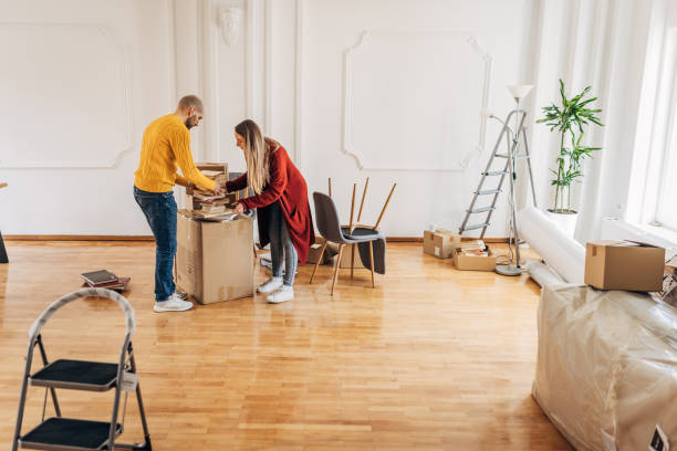 istock Couple unpacking in new home 1313793718