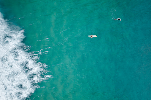Aerial photograph of surfers in the ocean taken in Cabarita, Tweed coast area of Northern New South Wales, Australia.