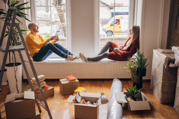 istock Couple relaxing in new home 1313795584