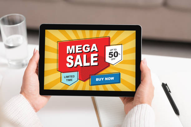 istock Business Woman Using Digital Tablet With Mega Sale Screen 1313795585
