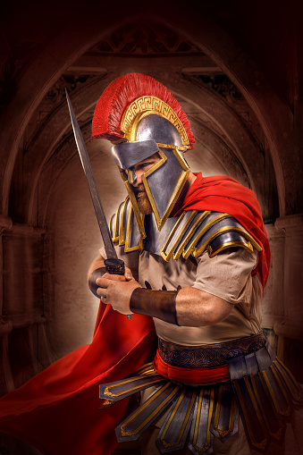 A modern, superhero, comic book re-interpretation of a redhead Warrior Gladiator in a fire filled fighting arena