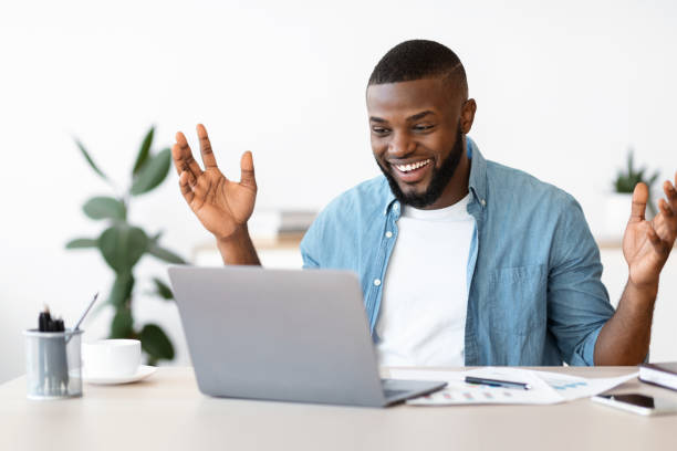 istock Happy Black Freelancer Man Celebrating Success While Working Online On Computer 1313798979