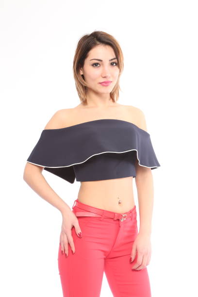 istock young woman in black bustier and red pants 1313799220
