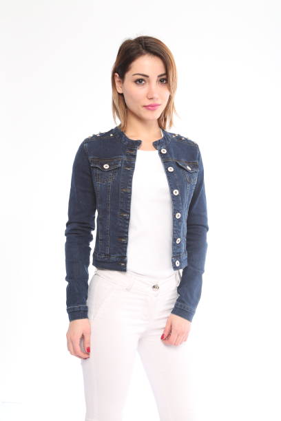 istock young woman in white jeans with blue denim jacket 1313799393