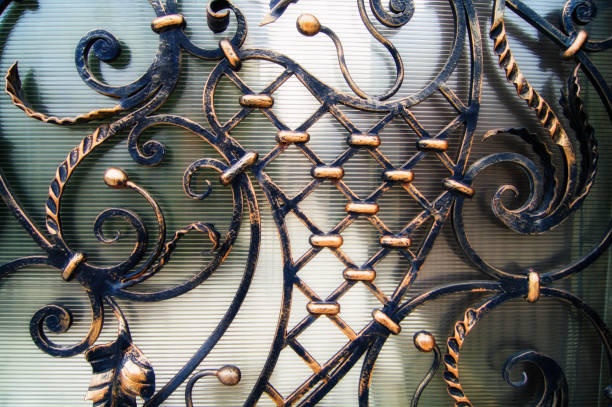 istock Decorative elements of metal forged gates. 1313799994
