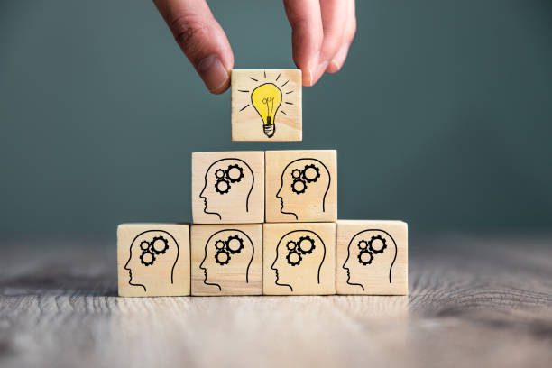 istock cubes with head symbols and light bulb 1313801123