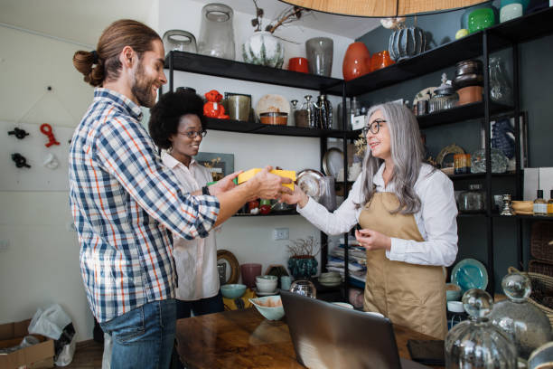 istock Young diverse couple buying decor at modern store 1313801129