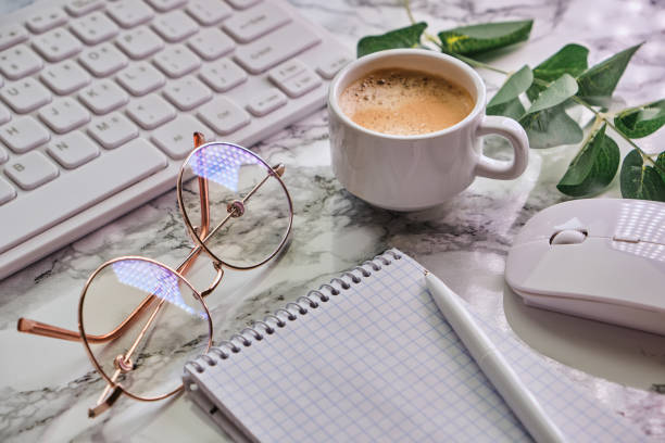 istock Workplace mockup with notebook, glasses, headphones and make up accessories 1313801572