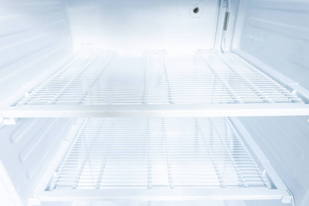istock domestic fridge freezer defrost problem concept. refrigerator covered with ice. appliance repair concept 1313801823