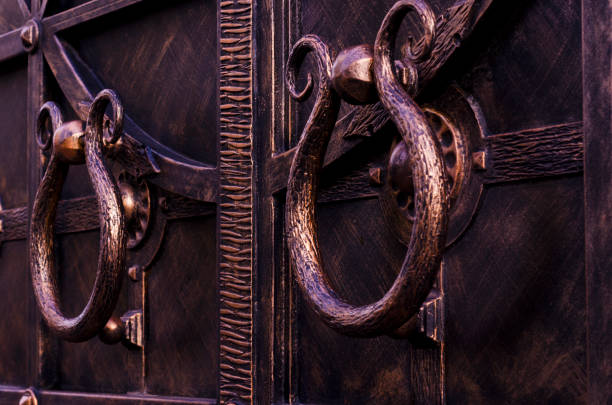 istock Round handles of a beautiful metal gate. 1313801985