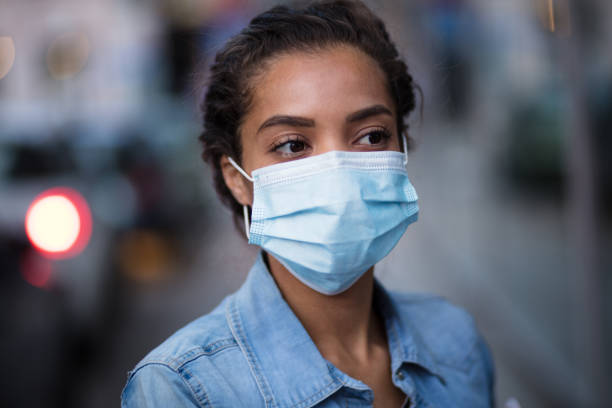 istock Woman with face mask. 1313801992