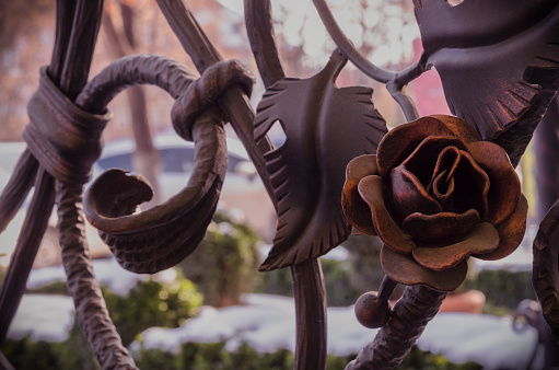 Decorative rose. Metal fence decoration