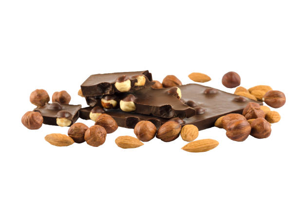 istock Mendal and hazelnuts with chocolate on a white background. Isolated photos. 1313804677