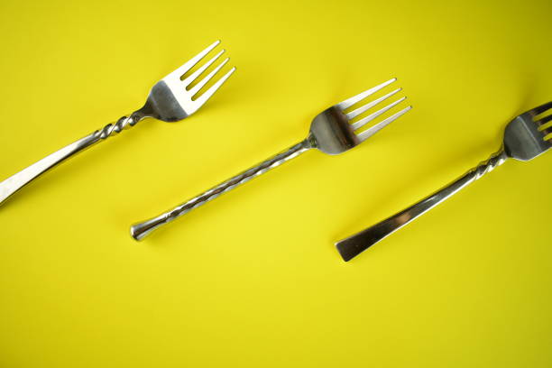 istock sliver wares spoon and fork on bright background 1313807389