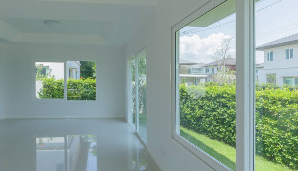 istock Empty room with glass window frame house interior on concrete wall 1313807502