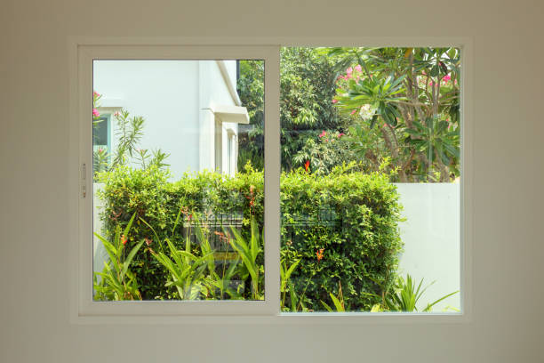 istock Glass window frame house interior on white wall 1313807505