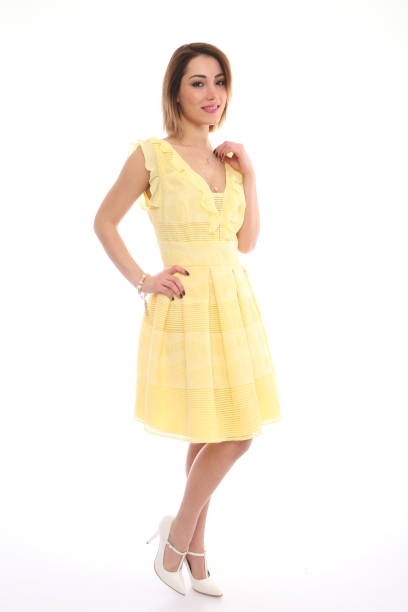istock woman in yellow dress 1313807634