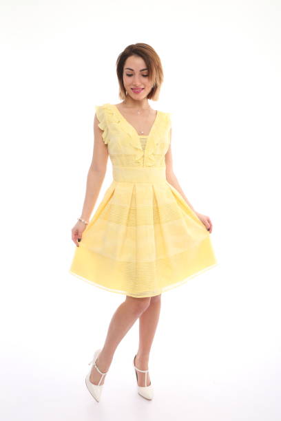 istock woman in yellow dress 1313807675