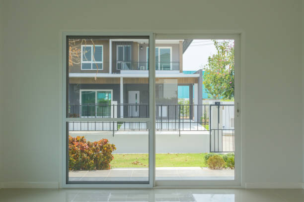 Empty room with glass door window frame house interior on concrete wall