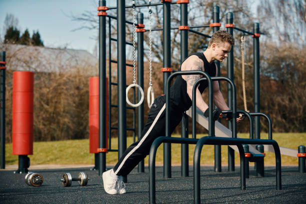 istock Young man exercising outdoors 1313808944