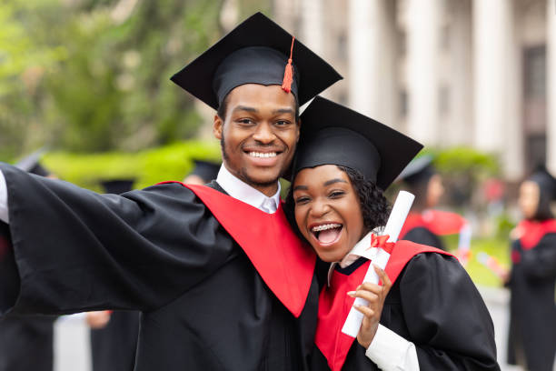 istock Happy african american couple students taking selfie, closeup 1313809093