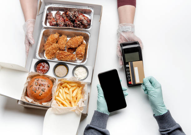 istock Modern fast pay, fried junk delicious food during coronavirus 1313809305