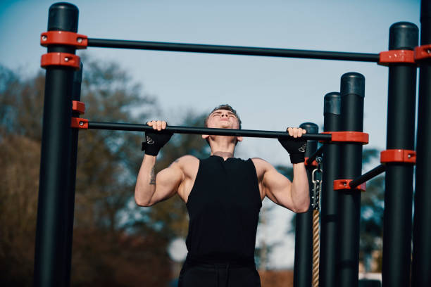 istock Young man exercising outdoors 1313809363