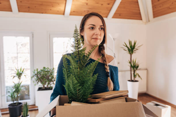 istock Woman in her new apartment 1313811982