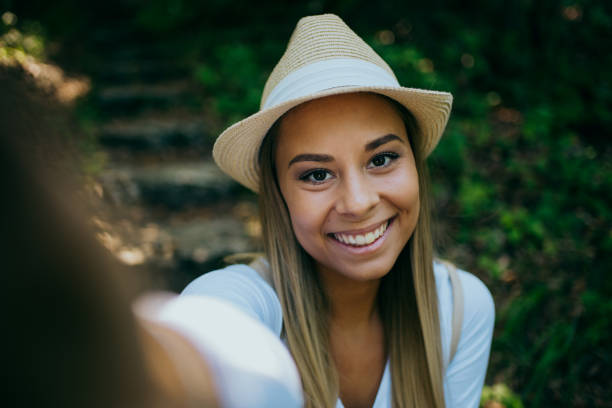 istock Happy woman hiking in mountains 1313812370