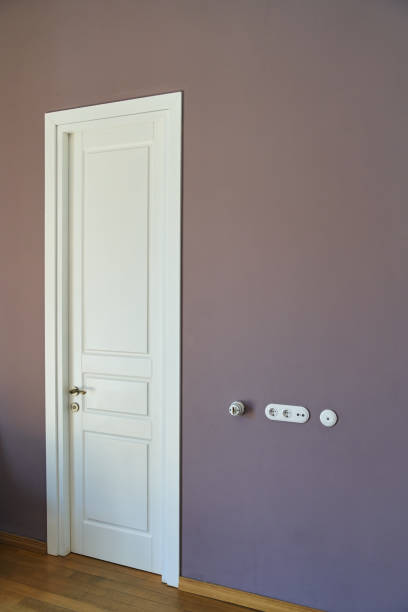 istock Closed modern white interior door with metal handle 1313813699