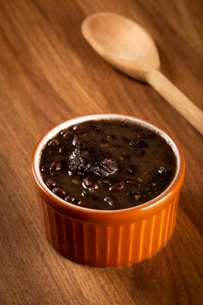 istock Black beans cooked in a bowl. Brazilian black beans. 1313816346